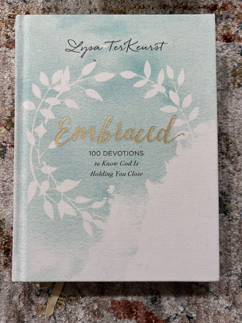 Embraced: 100 Devotions Hardcover Book - Mint & White